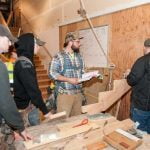 apprentices reading textbooks