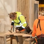 female apprentice hard at work