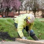 making sure the new sidewalk is perfect