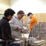 Instructor showing student how to build